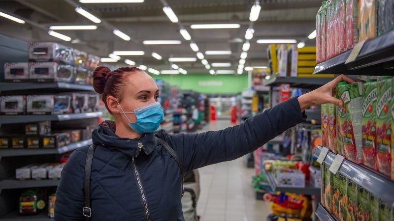 Customer in a grocery store wearing a mask