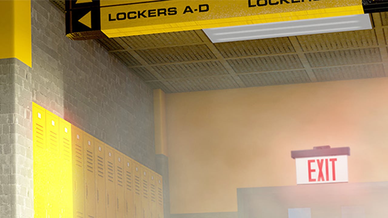 A school hallway lined with bright yellow metal lockers and an illuminated EXIT sign in the background
