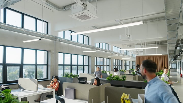 Bright office space with modern integrated ceiling lighting