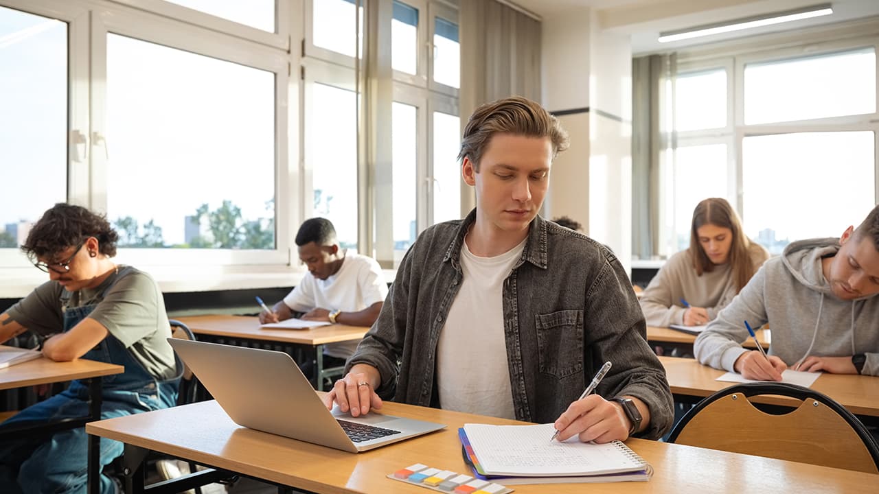 Student in a naturally lit classroom