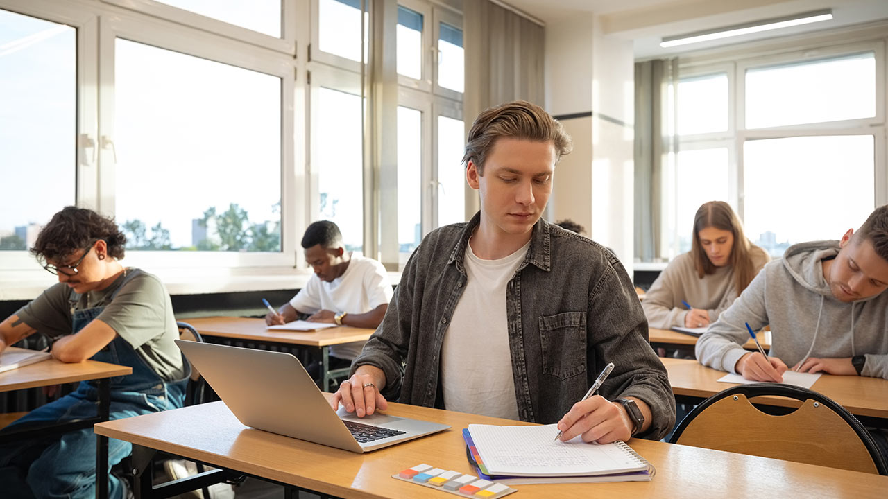 Student in a naturally lit classroom