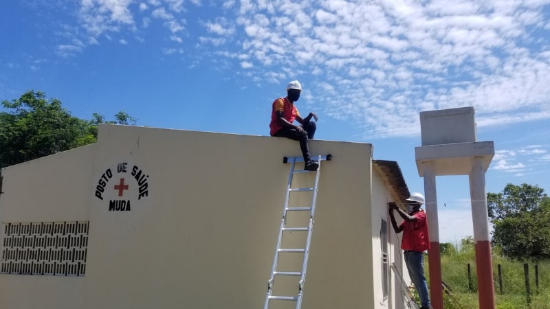 installation of solar powered lights outside clinics in Mozambique’