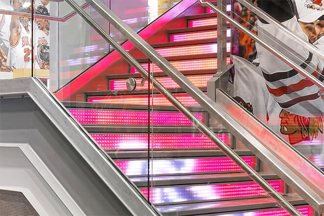 Chicago Sports Depot's stylish staircase makes a statement with dynamic LED  lighting