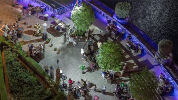 Night-time terrace with colored lighting