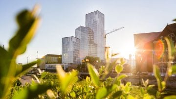 Modern building against blue sky on sunny day
