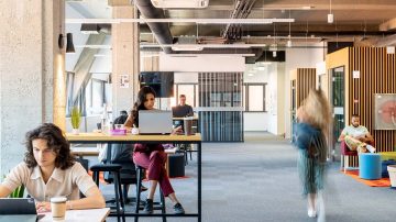 People working in an open office space