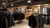 Dark garment with subtle lighting in a retail store